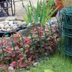 díszített kerti kerítés